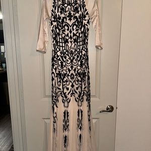 Beige and black gown